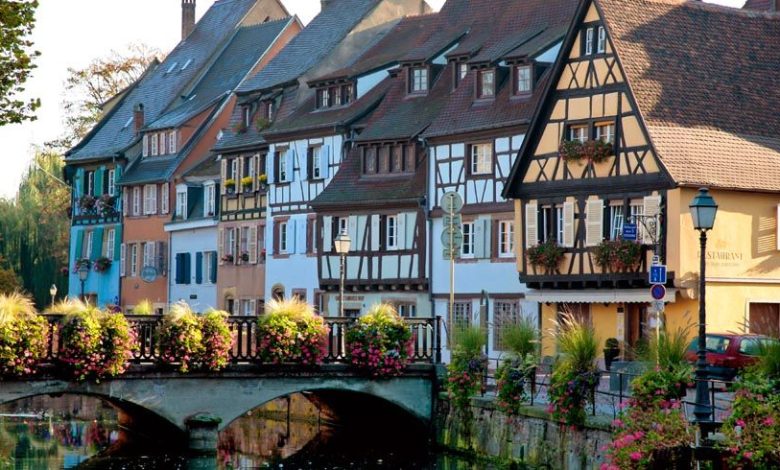 visiting france in 2023 - little medieval houses by the river in colmar